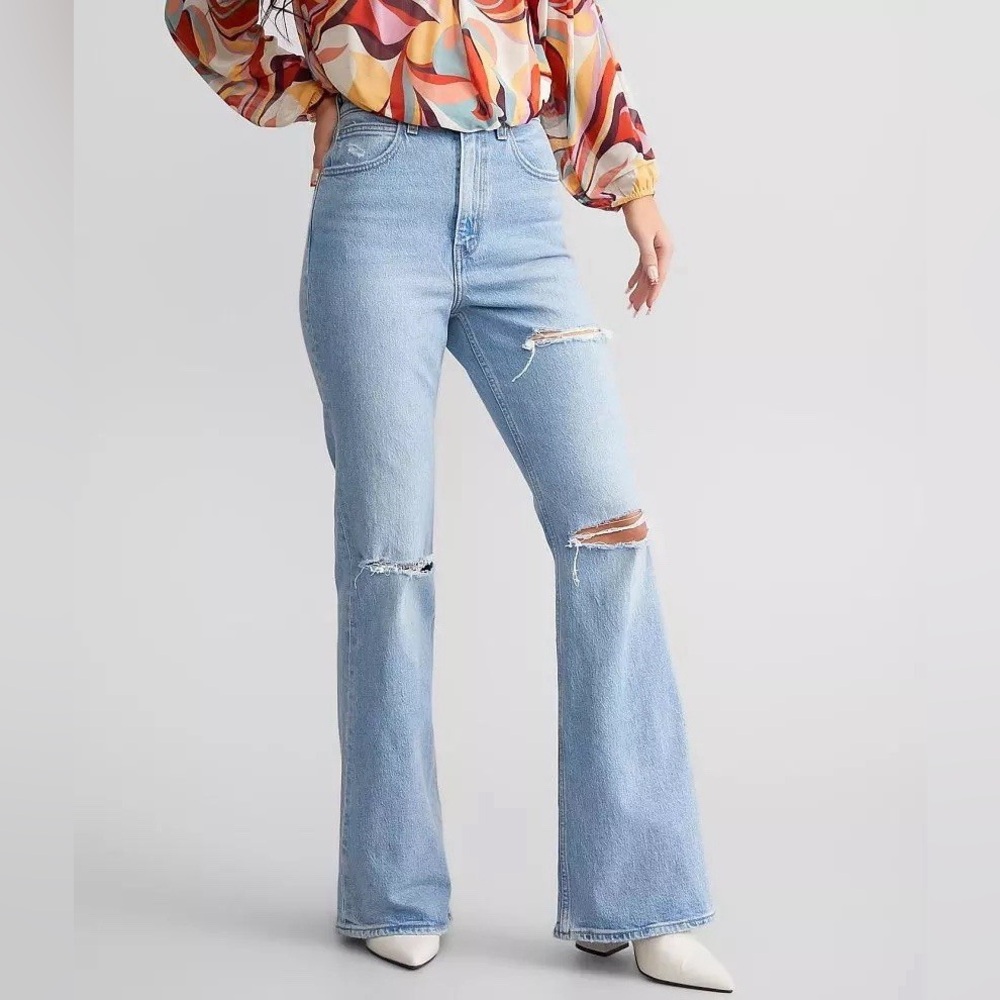 Levi's 70s High Flare distressed jeans in a light wash blue denim